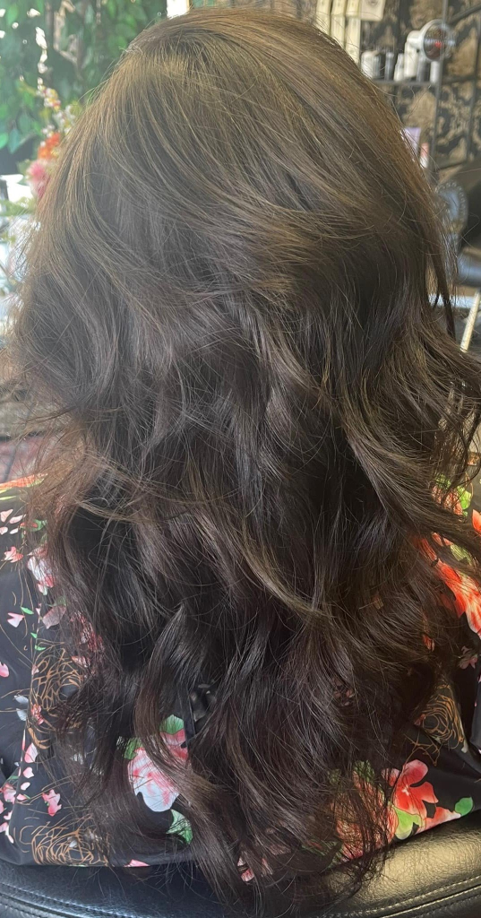 Restorative hair color focused on repairing damage and improving hair health