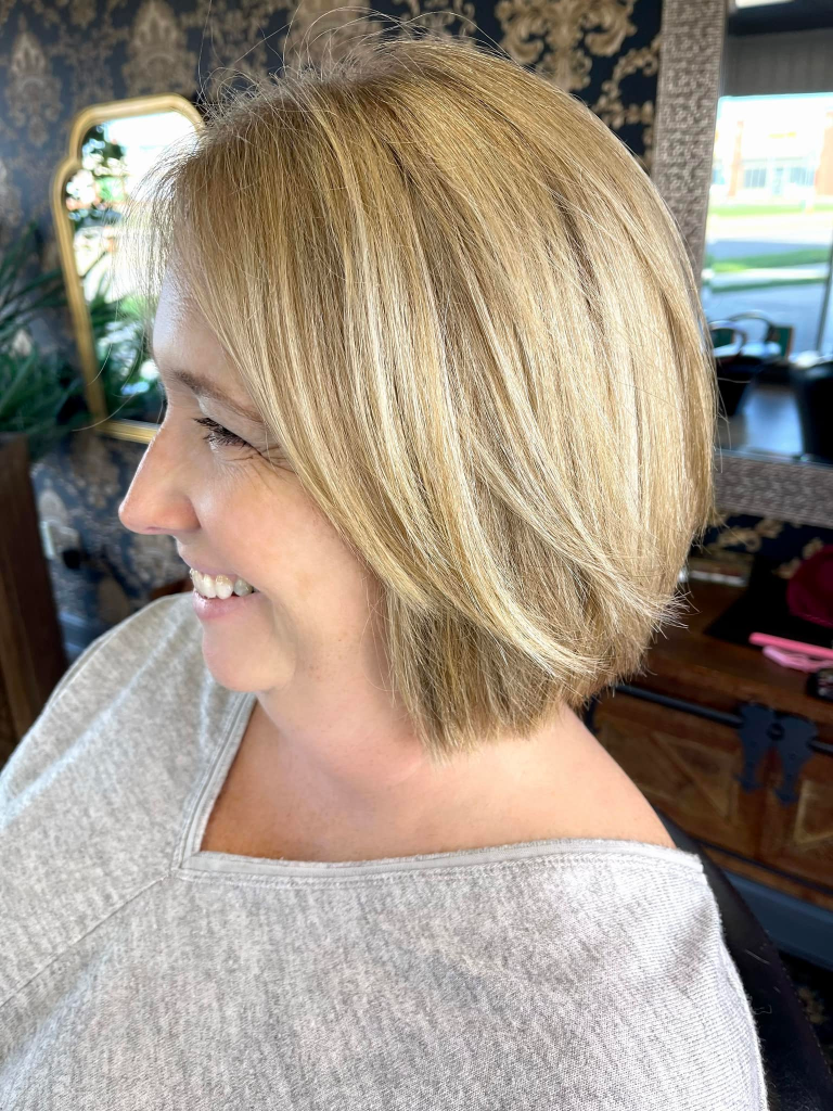 Blonding and brightening result by Cedar Rapids hair color specialist
